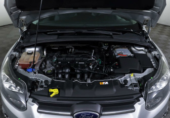 Подержанный автомобиль Ford Focus Sedan 2014 года (7 фото)