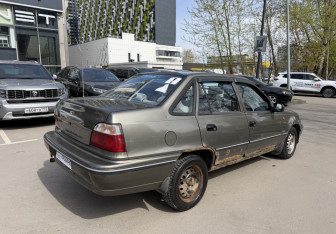 Подержанный автомобиль Daewoo Nexia Sedan 2003 года (5 фото)