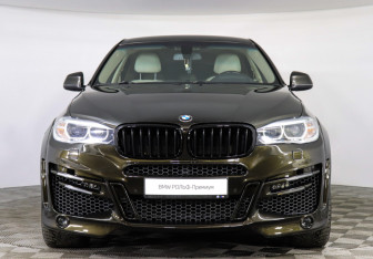 Подержанный автомобиль BMW X6 2015 года (3 фото)