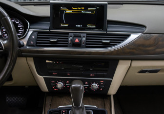 Подержанный автомобиль Audi A6 Sedan 2015 года (15 фото)