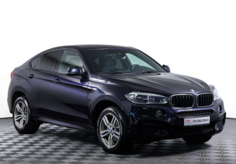Подержанный автомобиль BMW X6 2016 года (3 фото)