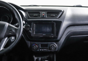 Подержанный автомобиль Kia Rio Sedan 2013 года (8 фото)