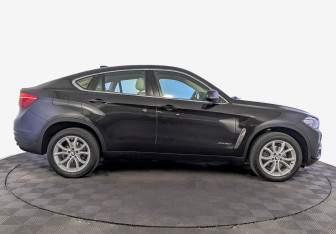 Подержанный автомобиль BMW X6 2015 года (4 фото)