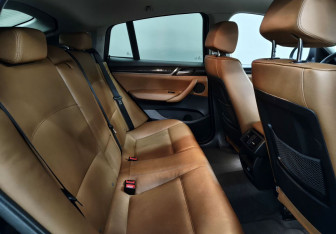 Подержанный автомобиль BMW X4 2016 года (13 фото)