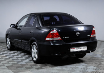 Подержанный автомобиль Nissan Almera Classic 2009 года (7 фото)