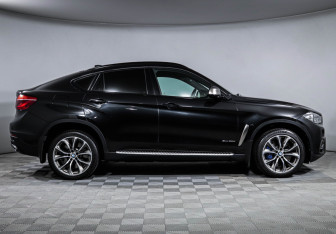 Подержанный автомобиль BMW X6 2017 года (4 фото)