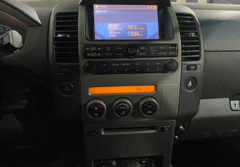 Подержанный автомобиль Nissan Pathfinder 2006 года (14 фото)