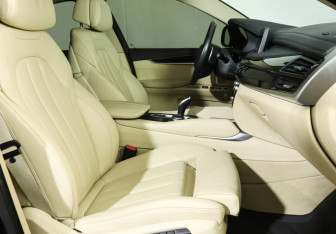 Подержанный автомобиль BMW X6 2015 года (14 фото)