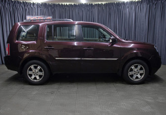 Подержанный автомобиль Honda Pilot 2013 года (4 фото)