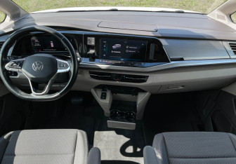 Подержанный автомобиль Volkswagen Multivan 2025 года (12 фото)
