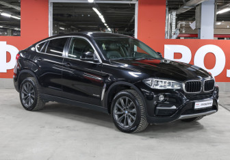 Подержанный автомобиль BMW X6 2015 года (3 фото)