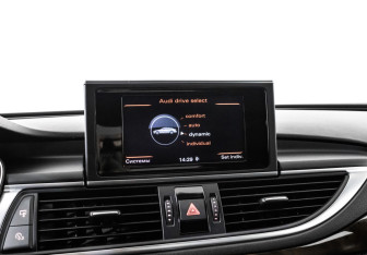 Подержанный автомобиль Audi A7 2014 года (21 фото)