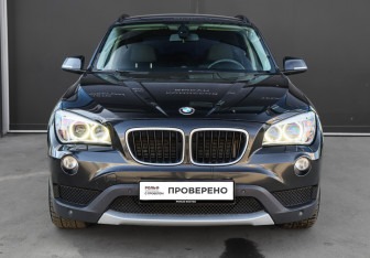 Подержанный автомобиль BMW X1 2014 года (2 фото)