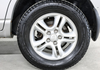 Подержанный автомобиль Kia Sportage 2006 года (21 фото)