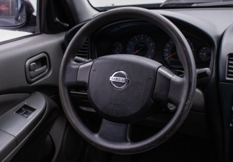 Подержанный автомобиль Nissan Almera Sedan 2012 года (15 фото)