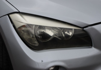 Подержанный автомобиль BMW X1 2014 года (23 фото)