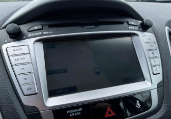 Подержанный автомобиль Hyundai ix35 2011 года (15 фото)