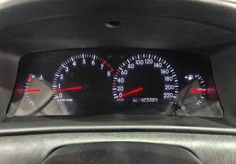 Подержанный автомобиль Toyota Corolla Sedan 2003 года (12 фото)