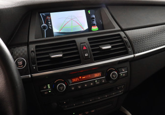 Подержанный автомобиль BMW X6 2013 года (13 фото)