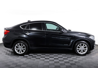 Подержанный автомобиль BMW X6 2015 года (4 фото)