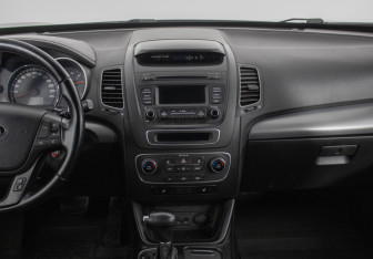 Подержанный автомобиль Kia Sorento 2013 года (14 фото)
