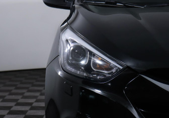 Подержанный автомобиль Hyundai ix35 2014 года (7 фото)