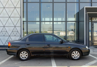 Подержанный автомобиль Kia Spectra Sedan 2006 года (4 фото)