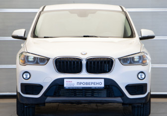Подержанный автомобиль BMW X1 2015 года (2 фото)