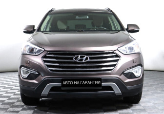 Подержанный автомобиль Hyundai Santa Fe 2014 года (2 фото)