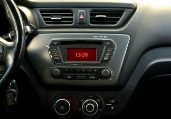 Подержанный автомобиль Kia Rio Sedan 2014 года (13 фото)