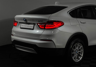 Подержанный автомобиль BMW X4 2017 года (18 фото)