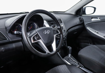 Подержанный автомобиль Hyundai Solaris Hatchback 2013 года (7 фото)