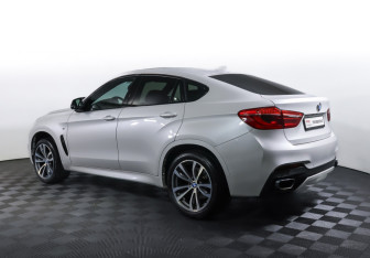 Подержанный автомобиль BMW X6 2016 года (7 фото)