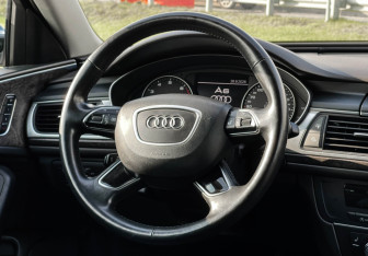 Подержанный автомобиль Audi A6 Sedan 2016 года (14 фото)