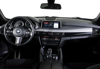 Подержанный автомобиль BMW X6 2018 года (12 фото)