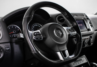 Подержанный автомобиль Volkswagen Tiguan 2016 года (14 фото)