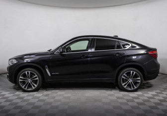 Подержанный автомобиль BMW X6 2016 года (8 фото)
