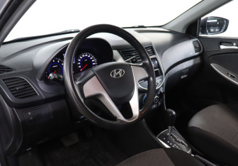 Подержанный автомобиль Hyundai Solaris Sedan 2014 года (13 фото)