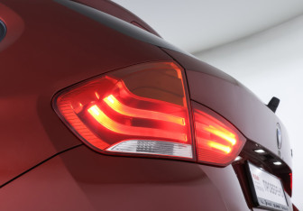 Подержанный автомобиль BMW X1 2010 года (19 фото)