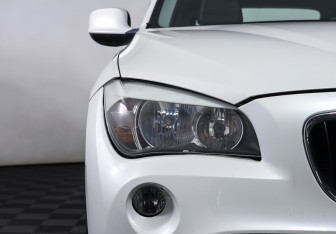 Подержанный автомобиль BMW X1 2011 года (19 фото)
