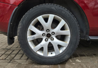 Подержанный автомобиль Mazda CX-7 2008 года (14 фото)