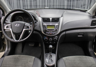 Подержанный автомобиль Hyundai Solaris Sedan 2012 года (13 фото)