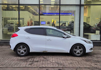 Подержанный автомобиль Kia Ceed Hatchback 2014 года (4 фото)