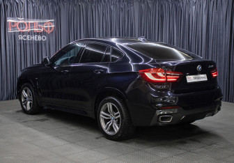 Подержанный автомобиль BMW X6 2017 года (7 фото)