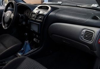 Подержанный автомобиль Nissan Almera Classic 2008 года (9 фото)