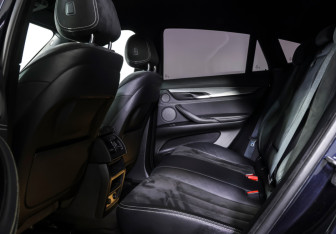Подержанный автомобиль BMW X6 2016 года (11 фото)