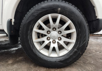 Подержанный автомобиль Mitsubishi Pajero Sport 2013 года (13 фото)