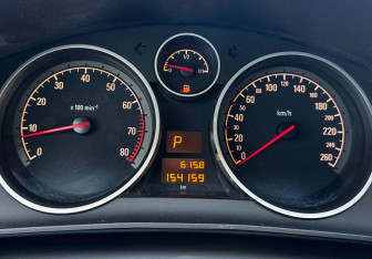 Подержанный автомобиль Opel Astra Wagon 2011 года (12 фото)