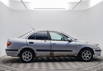 Подержанный автомобиль Nissan Almera Sedan 2001 года (4 фото)