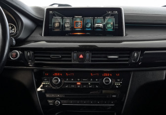 Подержанный автомобиль BMW X6 2016 года (17 фото)